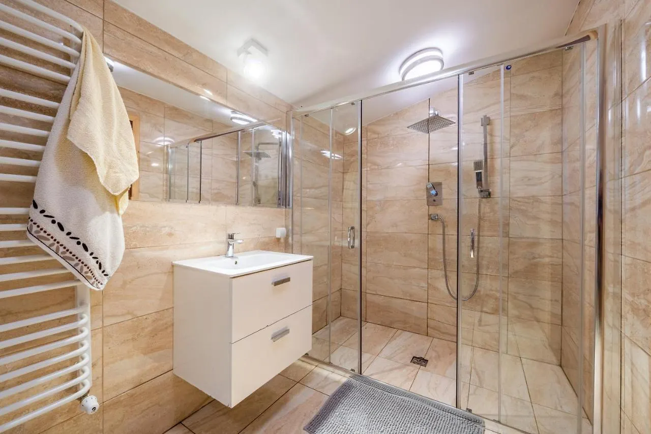 Quarto em Acomodações Particulares Dom Wypoczynkowy i Apartamenty Nabucco z widokiem na Giewont i Góry Zakopane