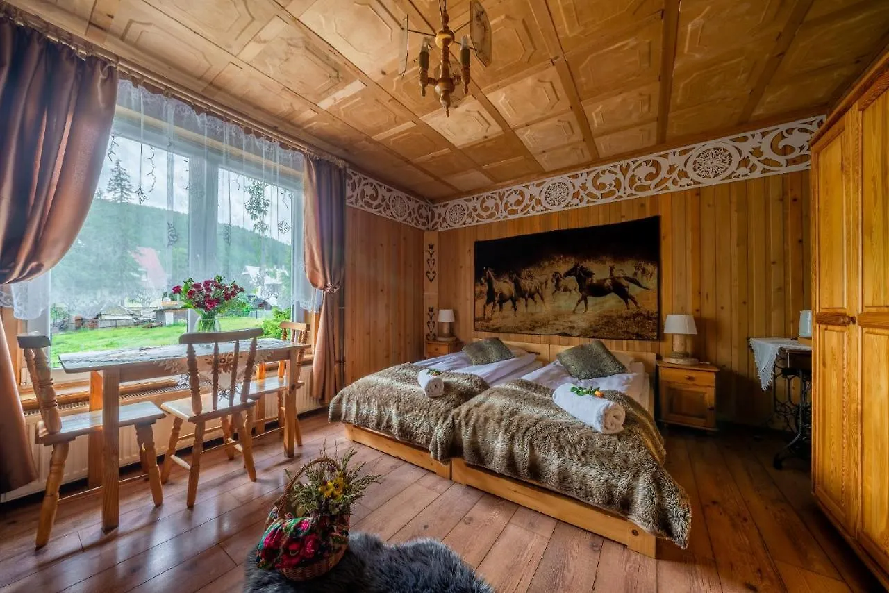 Quarto em Acomodações Particulares Dom Wypoczynkowy i Apartamenty Nabucco z widokiem na Giewont i Góry Zakopane