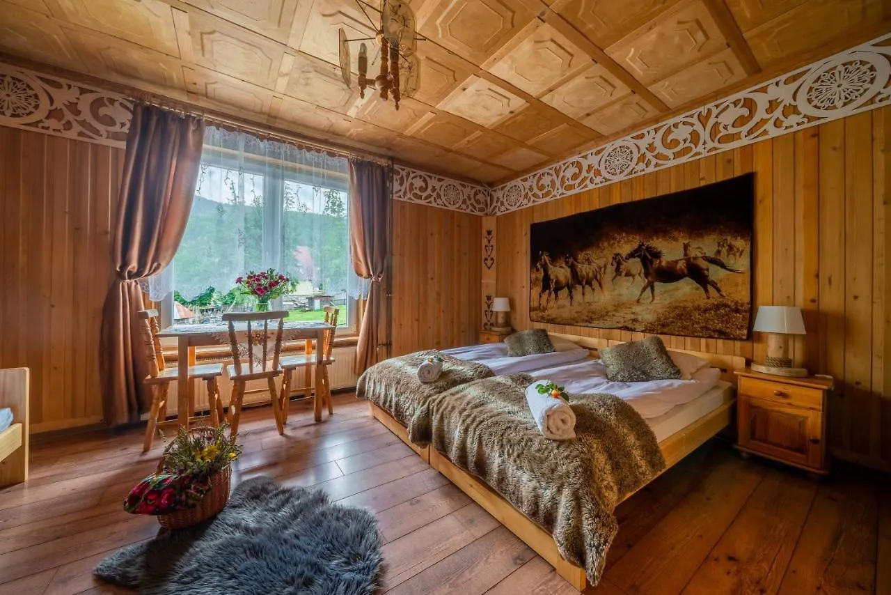 Quarto em Acomodações Particulares Dom Wypoczynkowy i Apartamenty Nabucco z widokiem na Giewont i Góry Zakopane